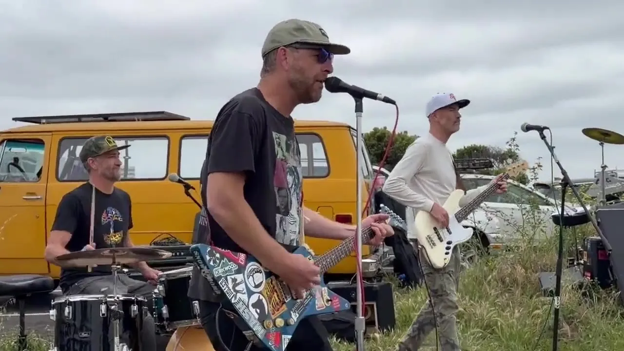 Torpedo Wharf playing in front of a yellow van in Emeryville